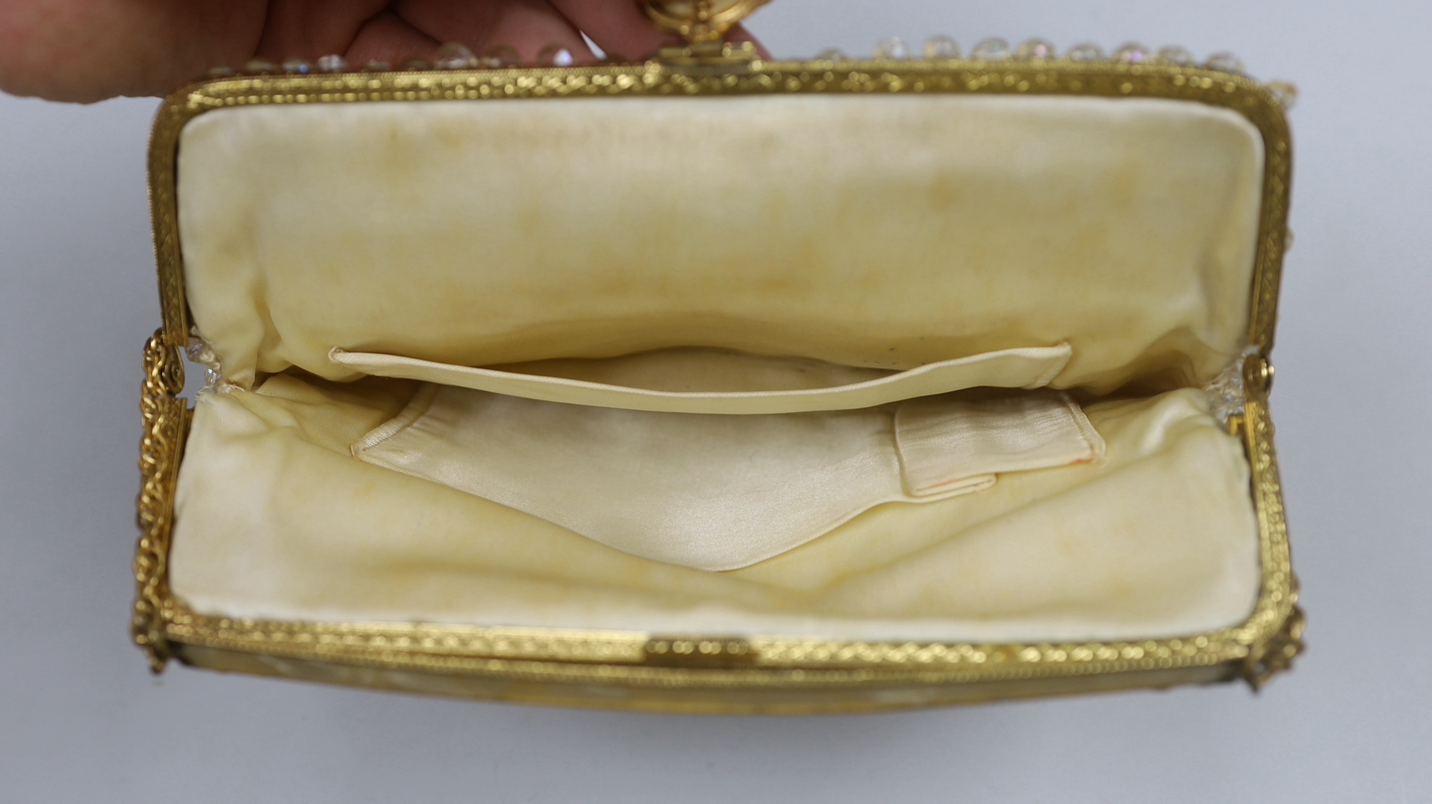 An evening purse, a shawl and pair of blue gloves